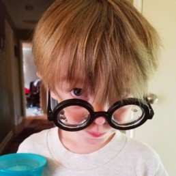 Ryder wearing oversized glasses